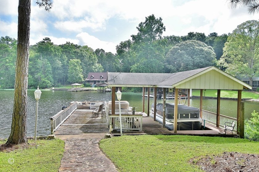 Wake up to breathtaking long-range views of Lake Harding from - photo 17