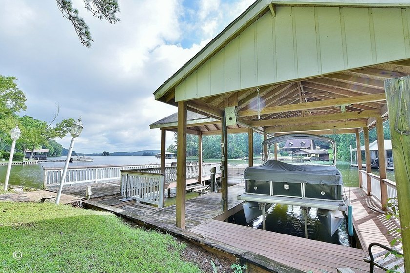 Wake up to breathtaking long-range views of Lake Harding from - photo 19