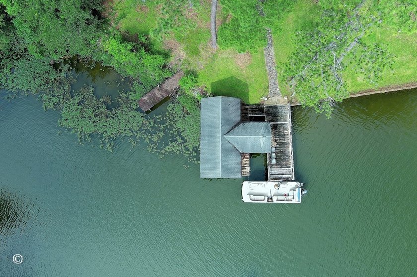 Wake up to breathtaking long-range views of Lake Harding from - photo 23