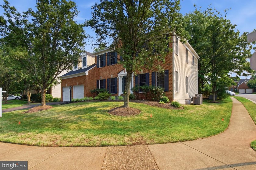 Welcome to this beautifully maintained brick-front home in the - photo 3
