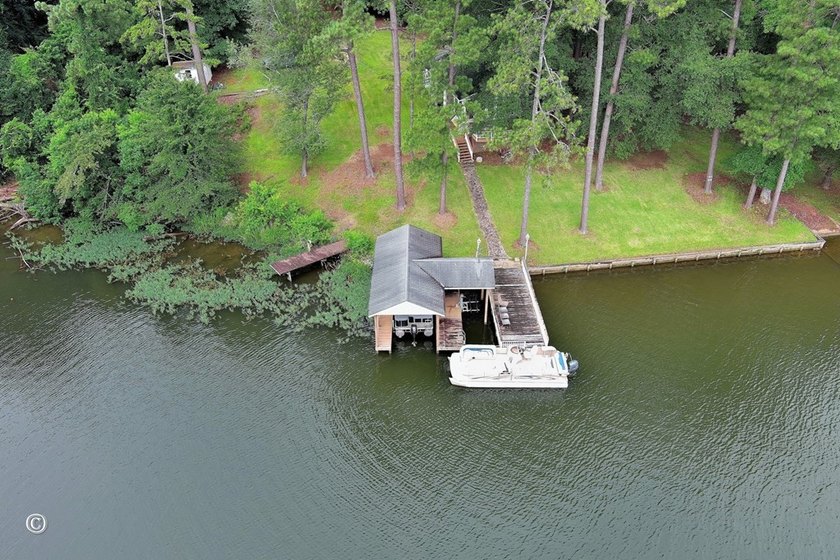Wake up to breathtaking long-range views of Lake Harding from - photo 25