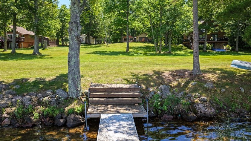 Escape to this charming four-season cabin on highly sought-after - photo 13