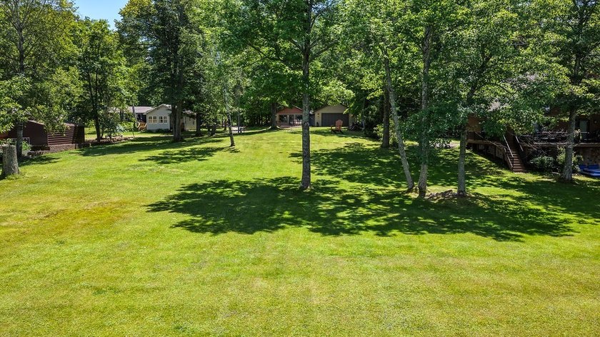 Escape to this charming four-season cabin on highly sought-after - photo 14