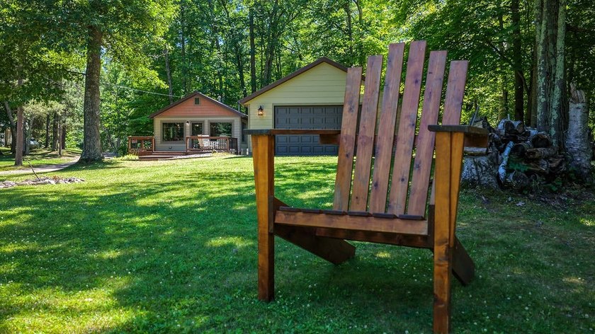 Escape to this charming four-season cabin on highly sought-after - photo 18