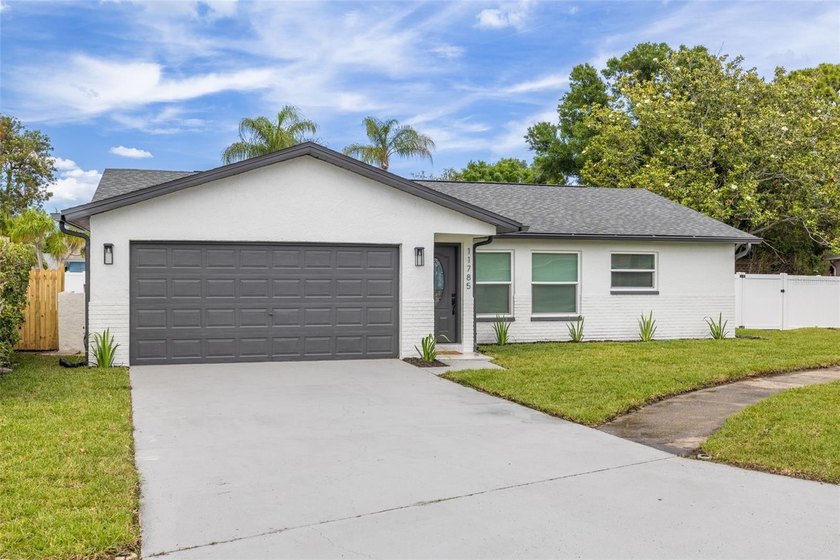 DISCOVER YOUR UPGRADED OASIS 4 beds, 2 full baths, POOL house in - photo 2