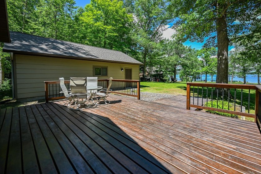 Escape to this charming four-season cabin on highly sought-after - photo 23
