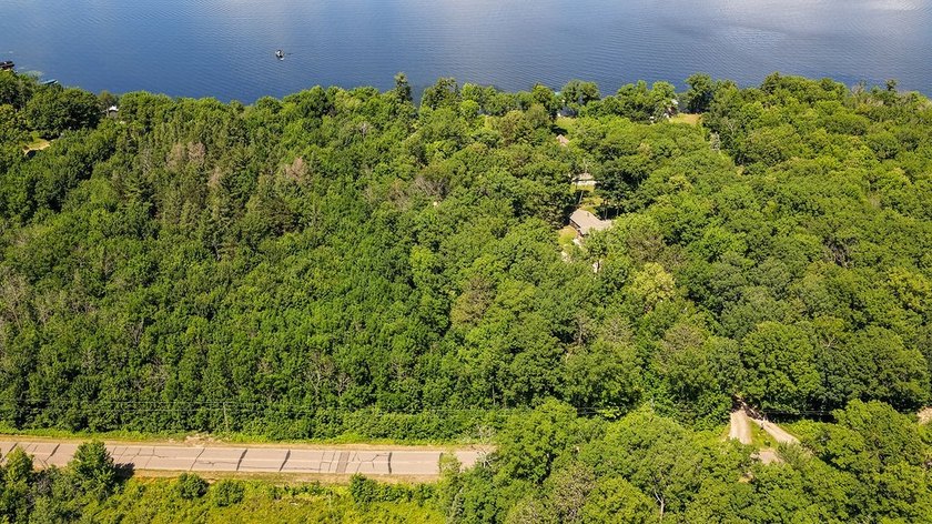 Escape to this charming four-season cabin on highly sought-after - photo 29