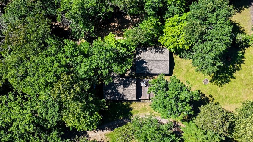 Escape to this charming four-season cabin on highly sought-after - photo 30