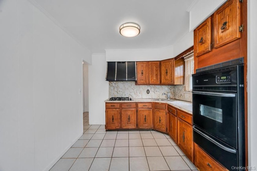 Welcome to this beautifully maintained 4-bedroom, 3 full - photo 13