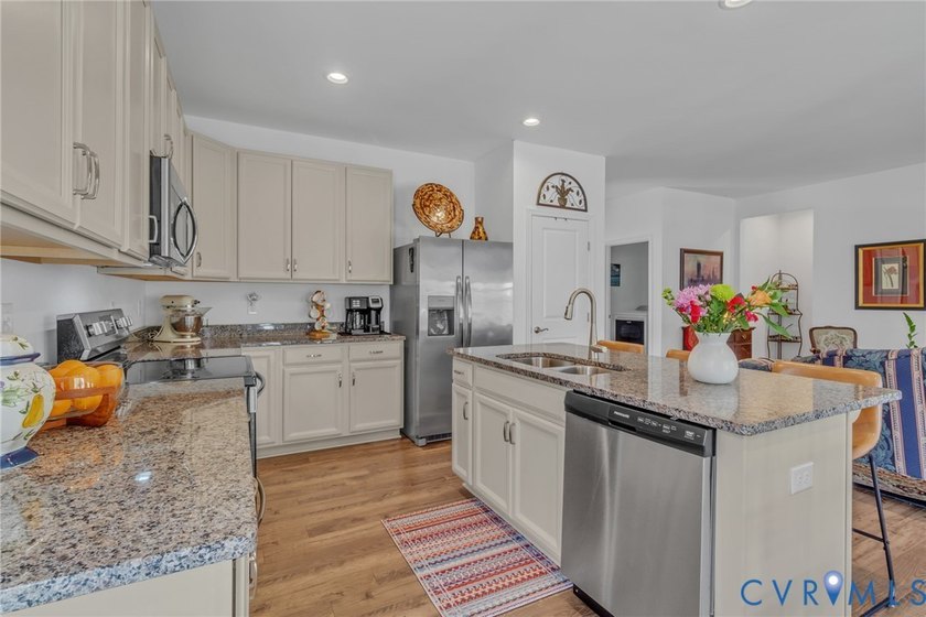 Welcome to 25 Essie Court - a 2022-built ranch-style home in the - photo 4