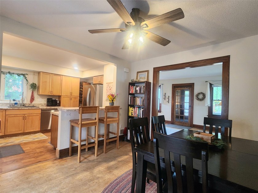 Nestled in a quiet, tree-lined neighborhood, this three-bedroom - photo 15