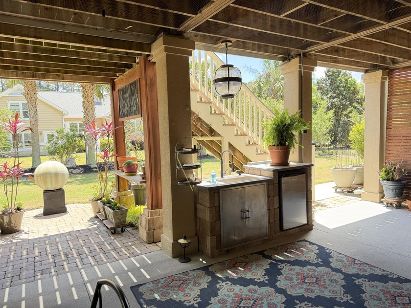 Welcome to this beautifully elevated Lowcountry-style home--the - photo 29