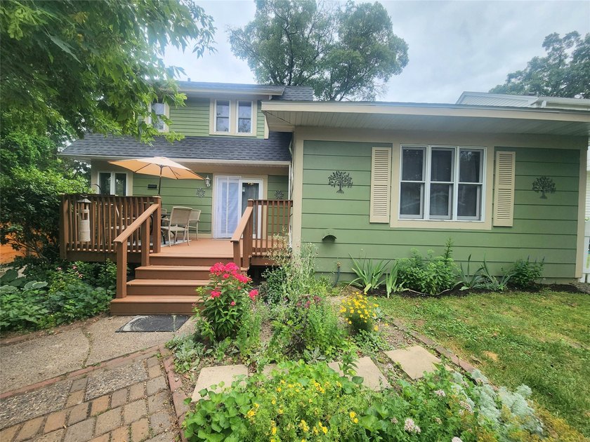 Nestled in a quiet, tree-lined neighborhood, this three-bedroom - photo 31