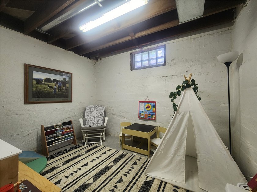 Nestled in a quiet, tree-lined neighborhood, this three-bedroom - photo 41