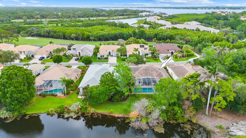 Discover luxury living in Palm Cove Golf &amp; Yacht Club in this - photo 5