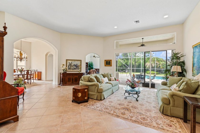 Discover luxury living in Palm Cove Golf &amp; Yacht Club in this - photo 10