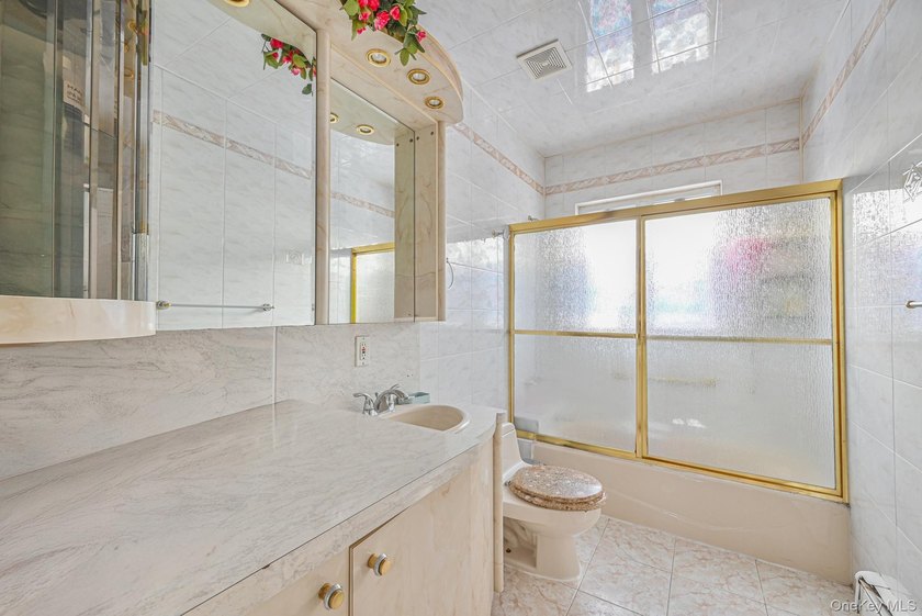 Welcome to this beautifully renovated legal two-family brick - photo 14