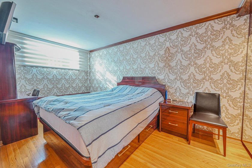 Welcome to this beautifully renovated legal two-family brick - photo 18
