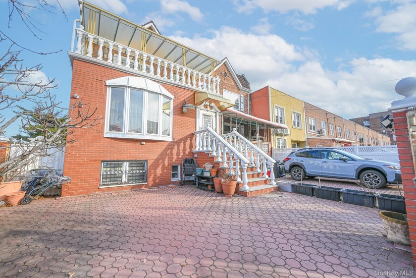 Welcome to this beautifully renovated legal two-family brick - photo 25