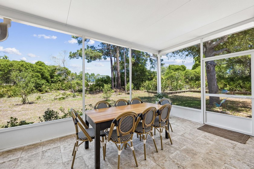 Tucked away in a secluded setting, this impressive three-bedroom - photo 12