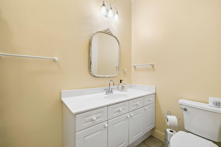 Tucked away in a secluded setting, this impressive three-bedroom - photo 22