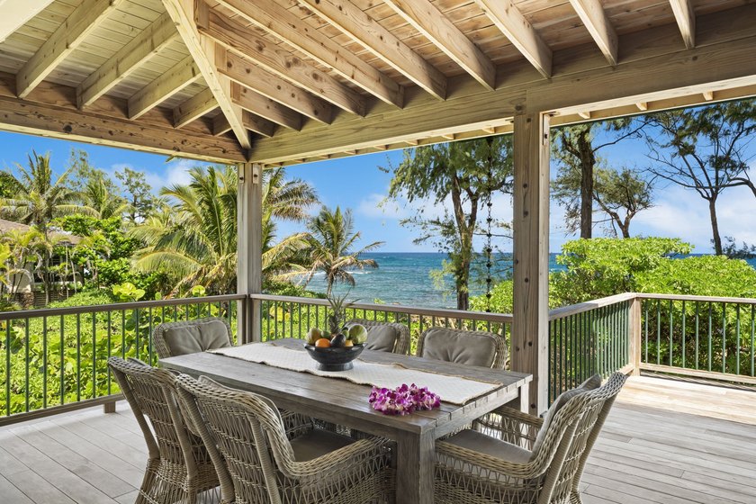 Nestled along the lush Haena coastline of Kauai, this gated - photo 2