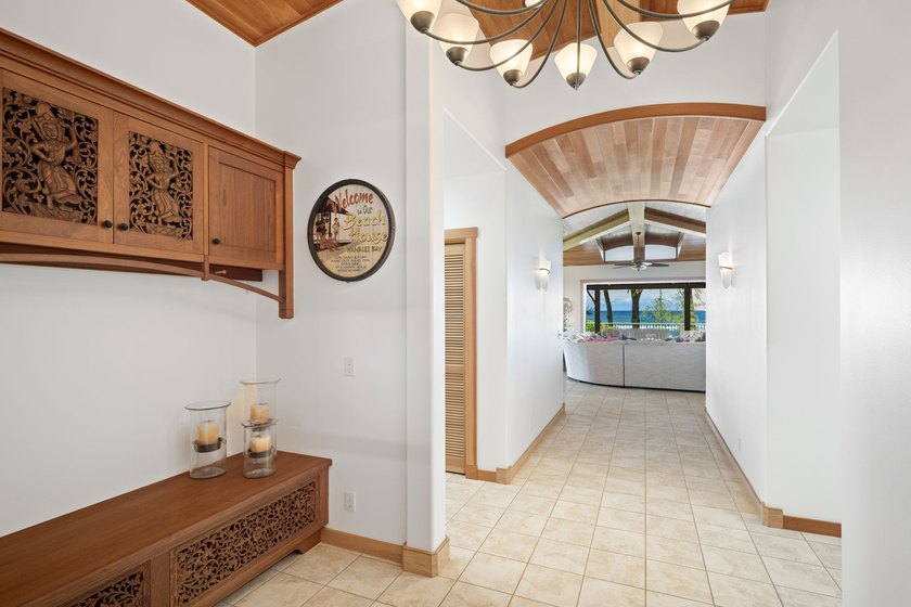 Nestled along the lush Haena coastline of Kauai, this gated - photo 3