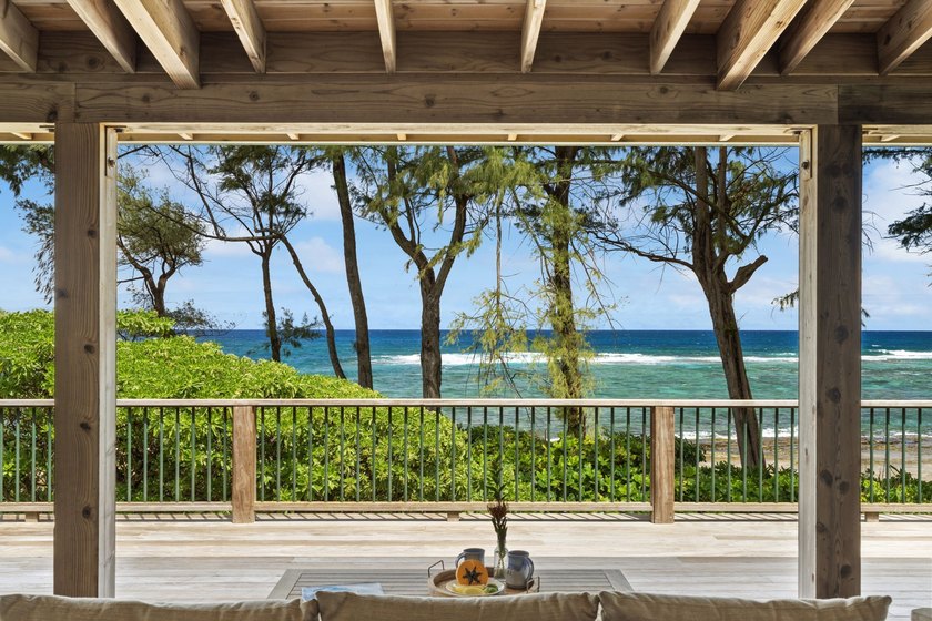 Nestled along the lush Haena coastline of Kauai, this gated - photo 9