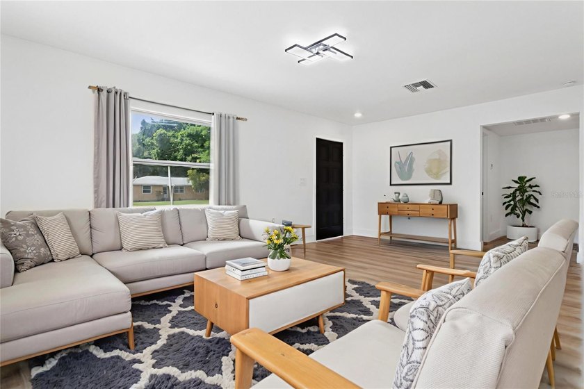 Look at this totally renovated home with a great location in - photo 3