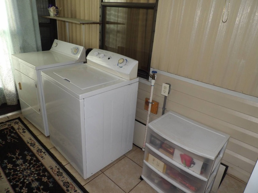 This cozy and partially furnished, 12 X 33 1 BR 1 BA home with - photo 10