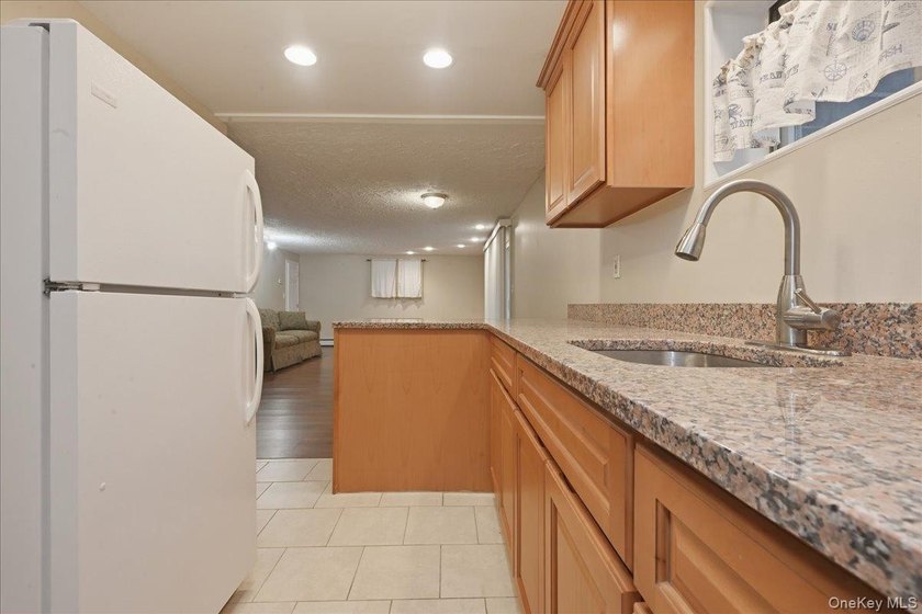 Welcome to this inviting waterfront home offering the perfect - photo 24