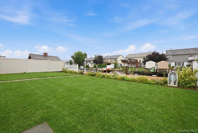 Welcome to this inviting waterfront home offering the perfect - photo 29