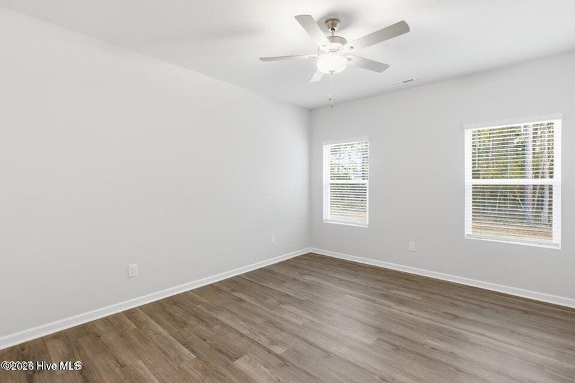 The Retreat plan offers a well-designed single-story layout with - photo 11