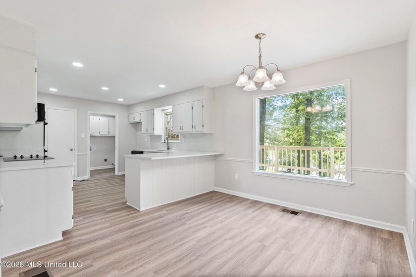 LIFE ON THE LAKE!! GORGEOUS TOTALLY RENOVATED HOME WITH THE MOST - photo 12