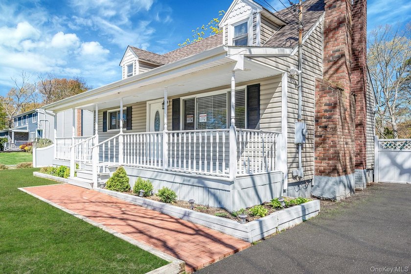 Beautiful Move-In Cape-Cod with Updated Kitchen With Lots Of - photo 12