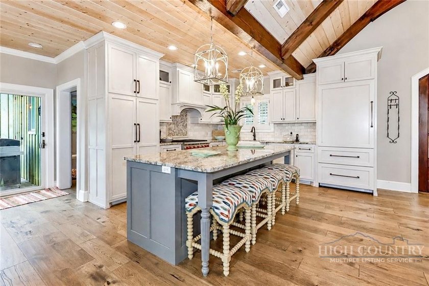 Experience elegant mountain living in this warm and inviting - photo 15