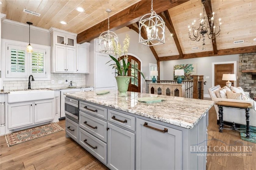 Experience elegant mountain living in this warm and inviting - photo 16