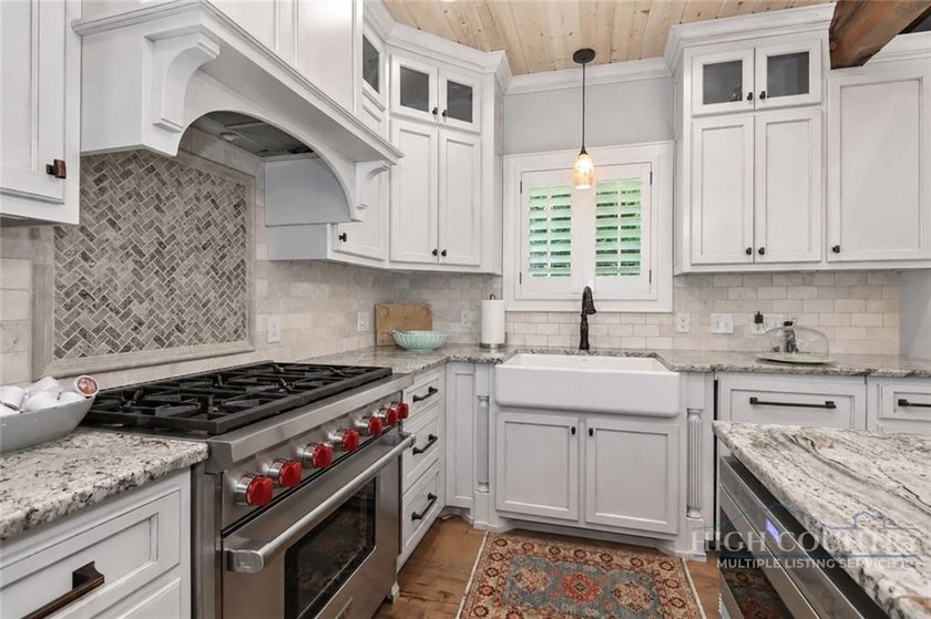 Experience elegant mountain living in this warm and inviting - photo 17