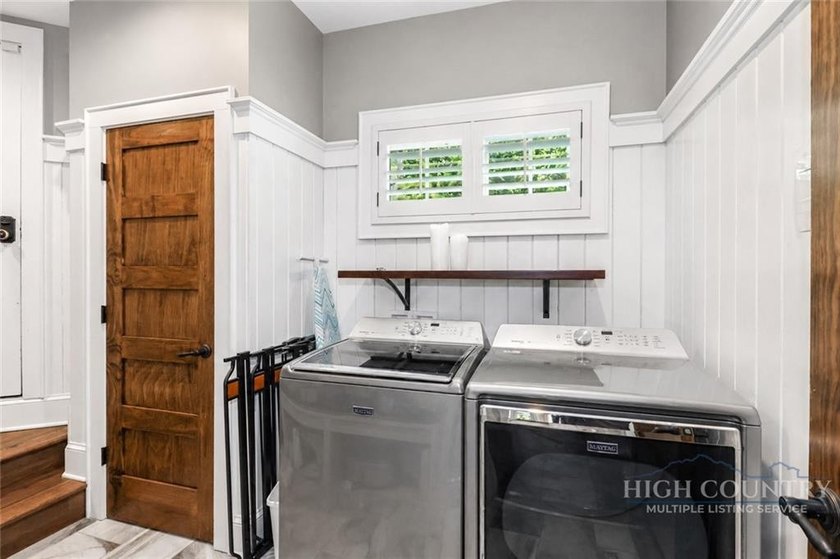 Experience elegant mountain living in this warm and inviting - photo 21