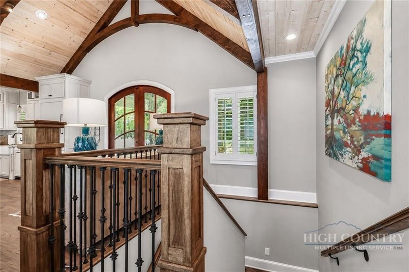 Experience elegant mountain living in this warm and inviting - photo 26