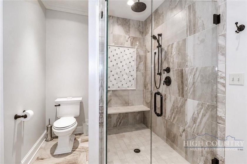 Experience elegant mountain living in this warm and inviting - photo 30