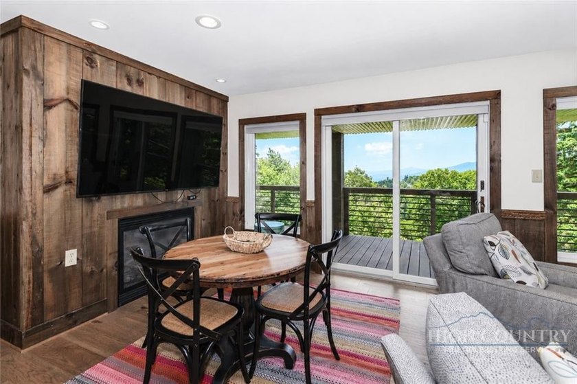 Experience elegant mountain living in this warm and inviting - photo 33