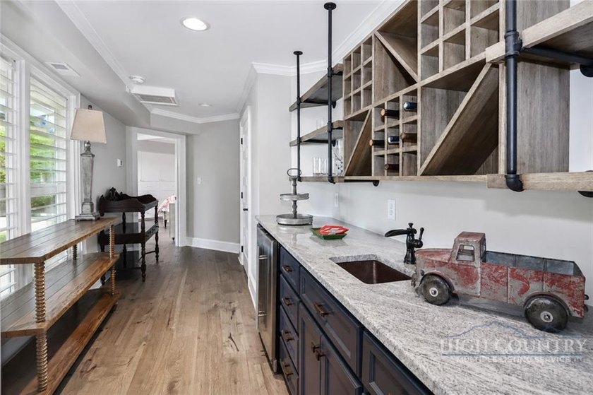 Experience elegant mountain living in this warm and inviting - photo 35