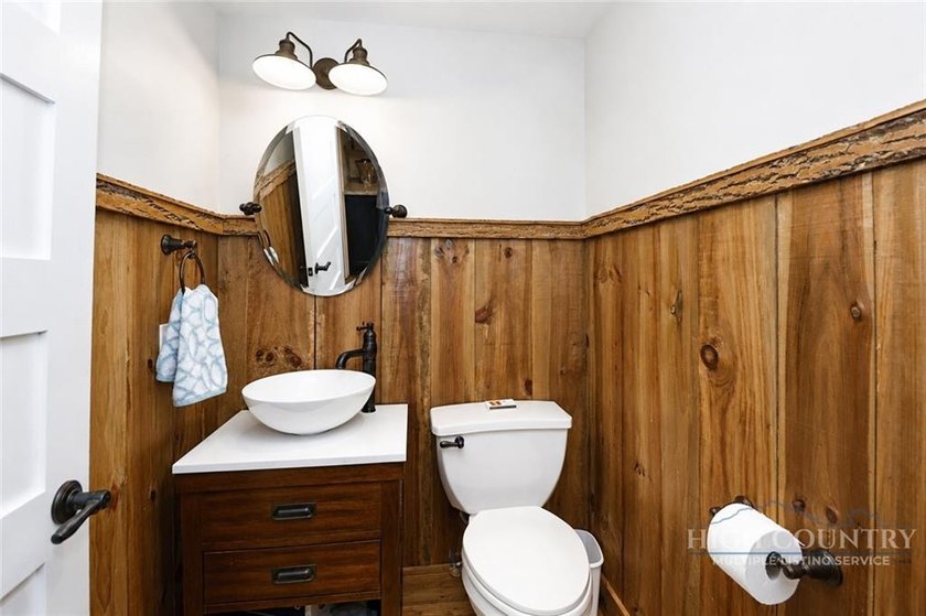 Experience elegant mountain living in this warm and inviting - photo 36