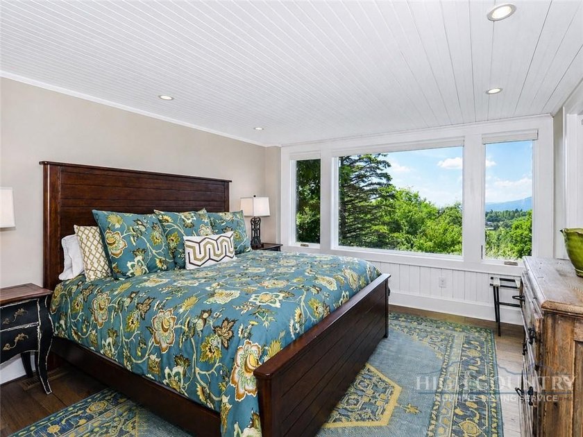 Experience elegant mountain living in this warm and inviting - photo 40