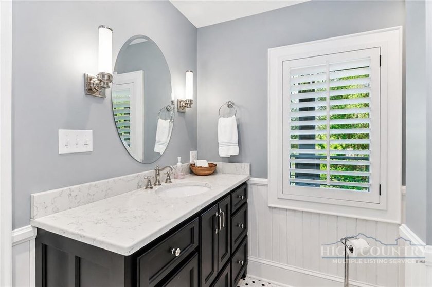 Experience elegant mountain living in this warm and inviting - photo 42
