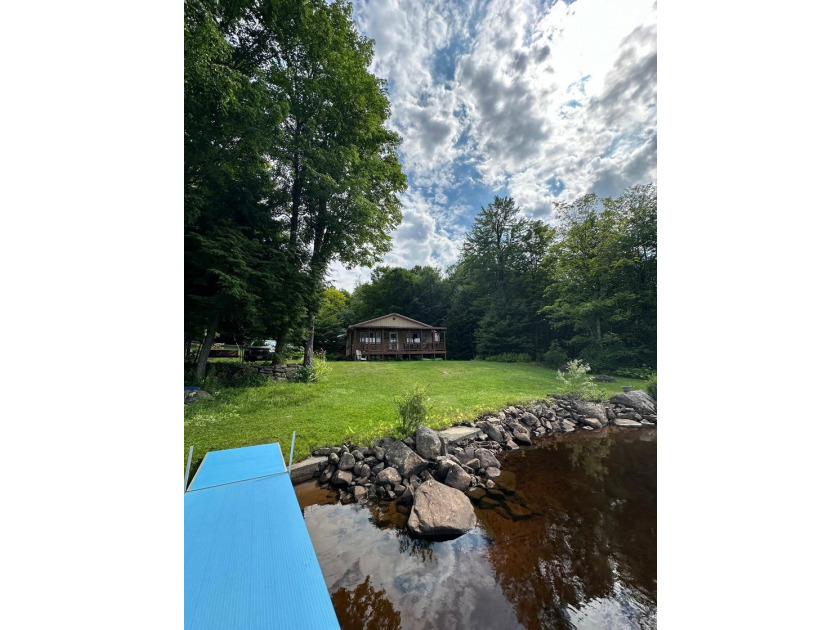 Welcome to your own waterfront retreat on Camp Road #1 in South - photo 13