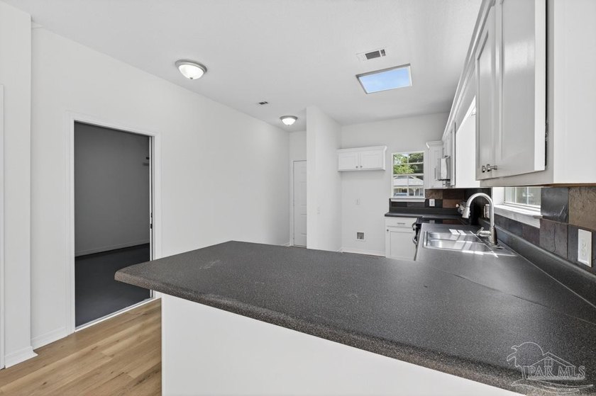UPDATED 3 bedroom/2 bath home with nearly 1,350 square feet, and - photo 11