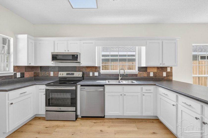 UPDATED 3 bedroom/2 bath home with nearly 1,350 square feet, and - photo 12