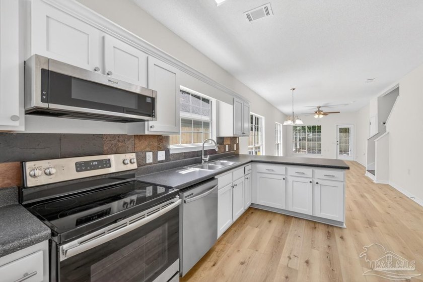UPDATED 3 bedroom/2 bath home with nearly 1,350 square feet, and - photo 14